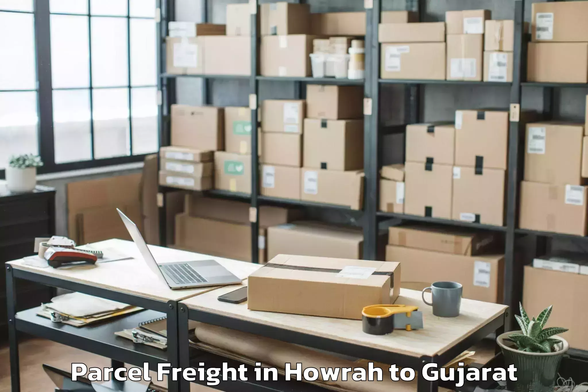 Professional Howrah to Udhana Parcel Freight